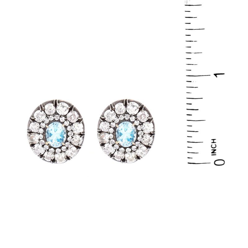 Approx. 12.0 Carat Antique Old European Cut Diamond, 5.0 Carat Oval Cut Aquamarine and Silver Topped 18 Karat Yellow Gold Earrings. 