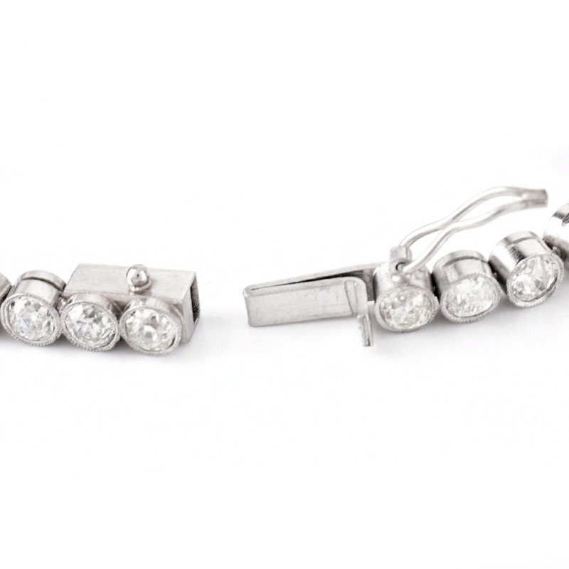 Approx. 13.0 Carat Thirty-Seven (37) Round Brilliant Cut Diamond and Platinum Line Bracelet. Unsigned.