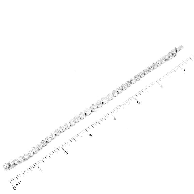 Approx. 13.0 Carat Thirty-Seven (37) Round Brilliant Cut Diamond and Platinum Line Bracelet. Unsigned.