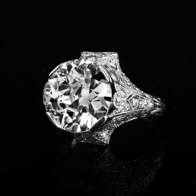 Important GIA Certified Art Deco style 9.38 Carat Old European Cut Diamond and Platinum Engagement Ring.