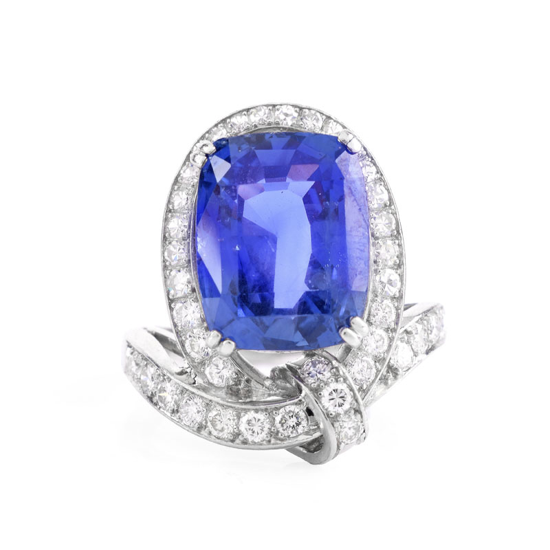 AGL Certified Circa 1940s Approx. 10.50 Carat Oval Cushion Cut Ceylon No Heat Sapphire, Approx. .80 Carat Diamond and Platinum Ring.
