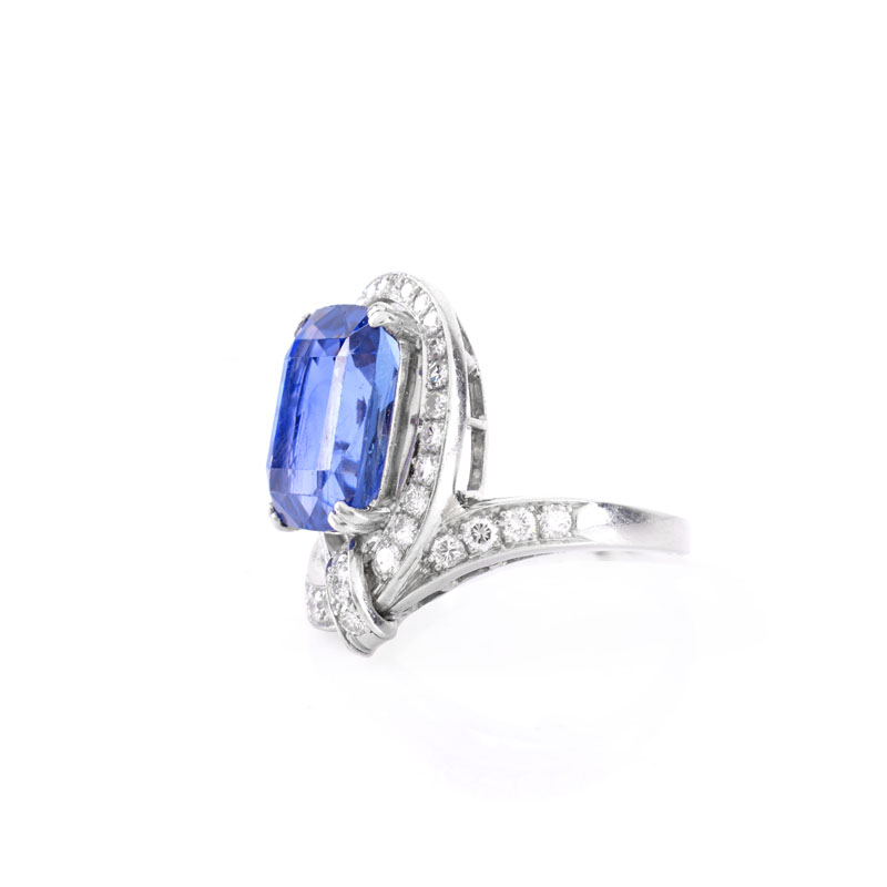 AGL Certified Circa 1940s Approx. 10.50 Carat Oval Cushion Cut Ceylon No Heat Sapphire, Approx. .80 Carat Diamond and Platinum Ring.