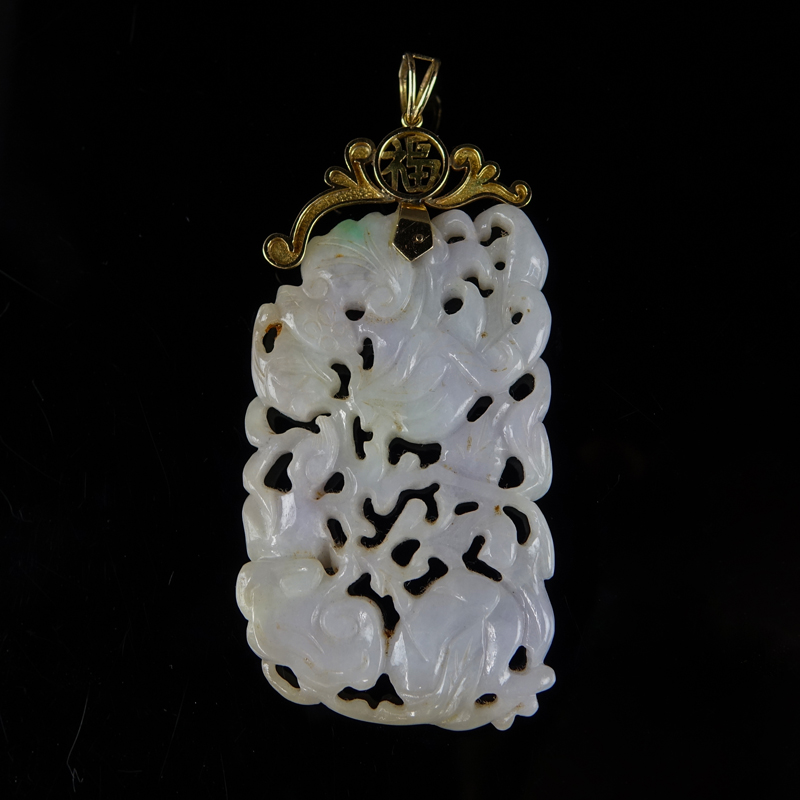 Antique Chinese Carved Lavender and Apple Green Jade Reticulated Floral Relief Pendant Mounted in 14 Karat Yellow Gold.