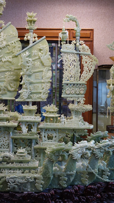 Massive Approx. 2,000 lbs, Chinese Heavily Carved Jade Dragon Ship Mounted on Heavily Carved Wood Base.