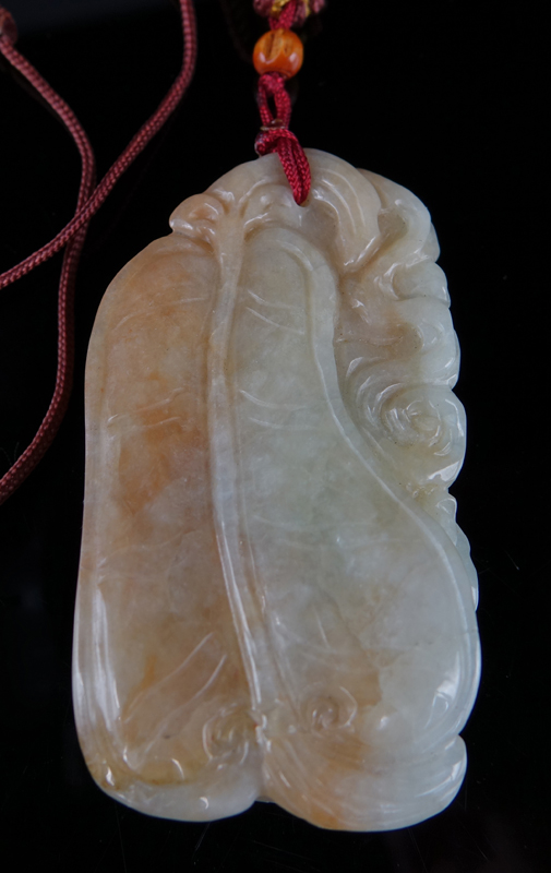 Antique Chinese Carved Celadon to Russet Jade Pendant on Cord Necklace. High relief foo dog.