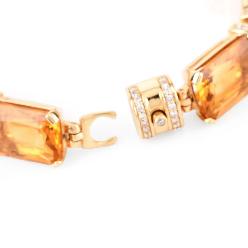 Eight (8) Rectangular Cut Citrine, Diamond and 14 Karat Yellow Gold Bracelet. 