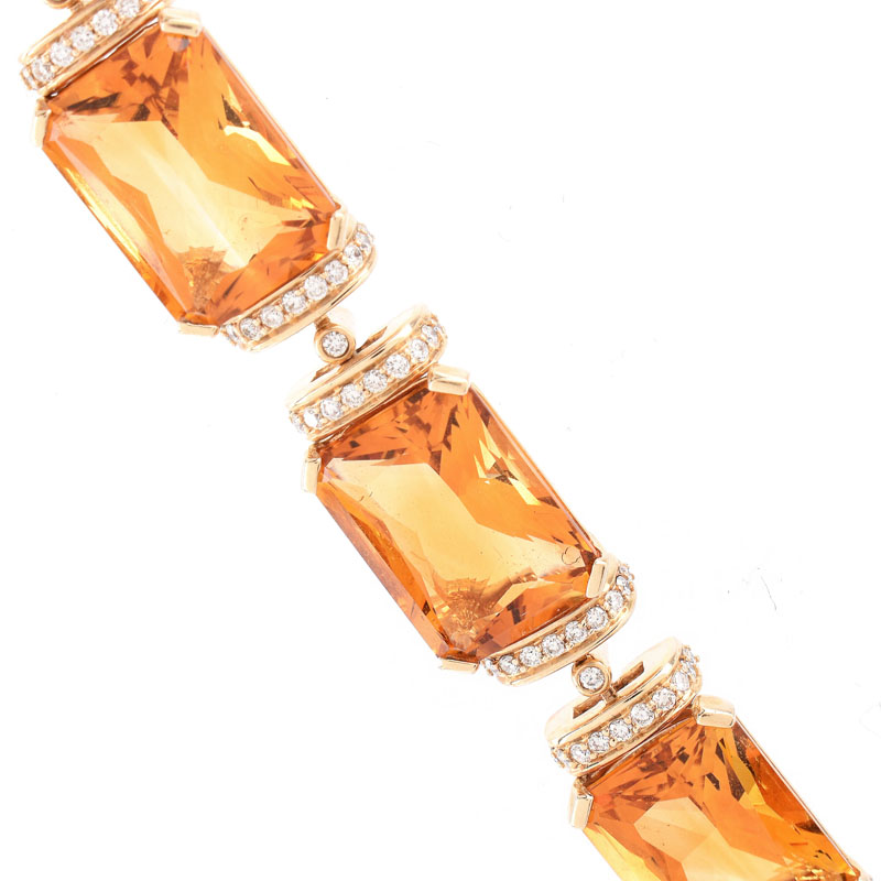 Eight (8) Rectangular Cut Citrine, Diamond and 14 Karat Yellow Gold Bracelet. 