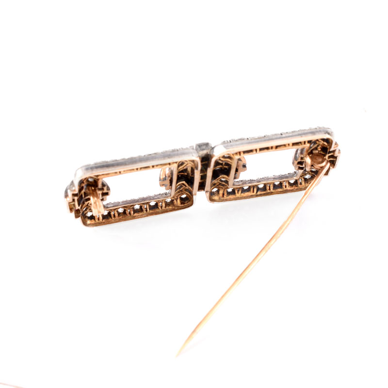 Antique Old European Cut and Rose Cut Diamond, Ruby, Enamel and Silver Topped 18 Karat Yellow Gold Brooch. 