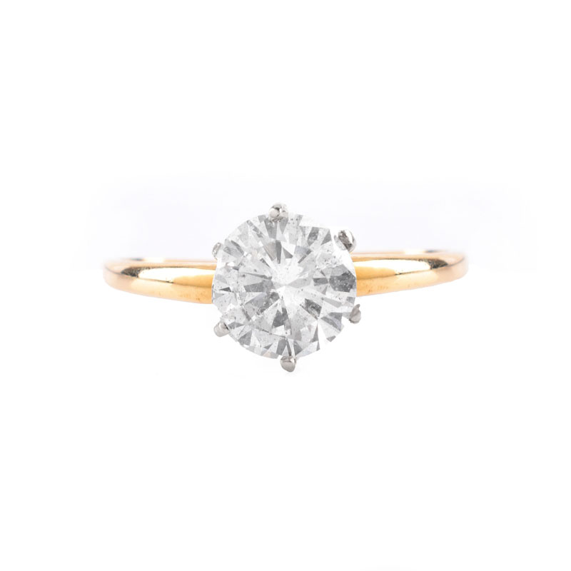U.S. Gemologic Certified 2.19 Carat Round Brilliant Cut Diamond and 14 Karat Yellow Gold Engagement Ring.