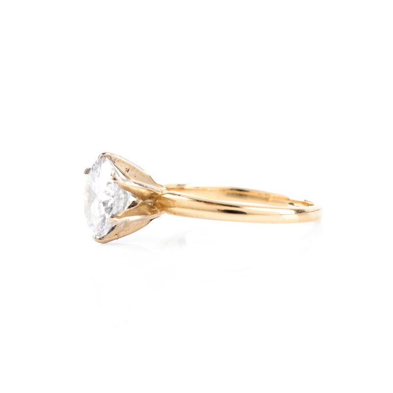 U.S. Gemologic Certified 2.19 Carat Round Brilliant Cut Diamond and 14 Karat Yellow Gold Engagement Ring.