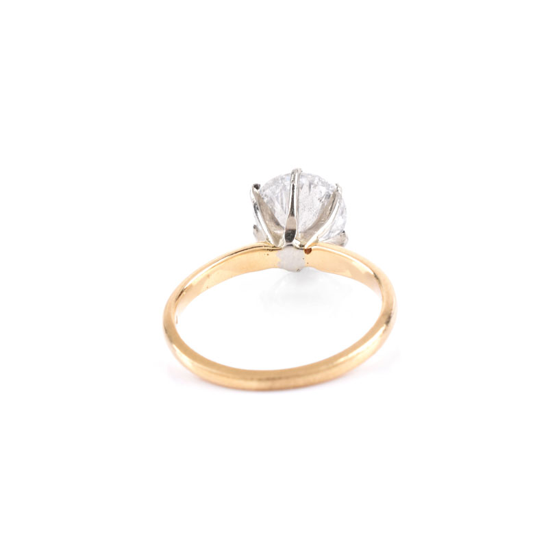 U.S. Gemologic Certified 2.19 Carat Round Brilliant Cut Diamond and 14 Karat Yellow Gold Engagement Ring.