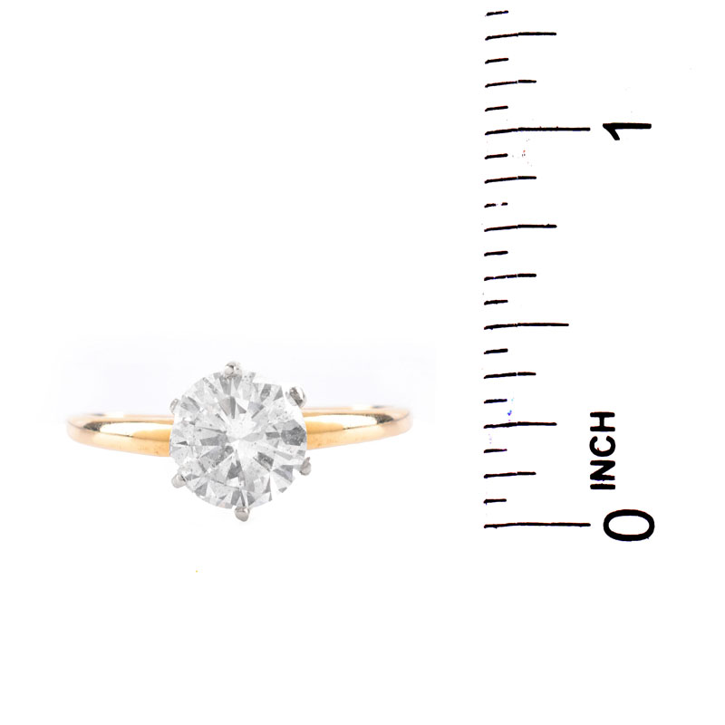 U.S. Gemologic Certified 2.19 Carat Round Brilliant Cut Diamond and 14 Karat Yellow Gold Engagement Ring.