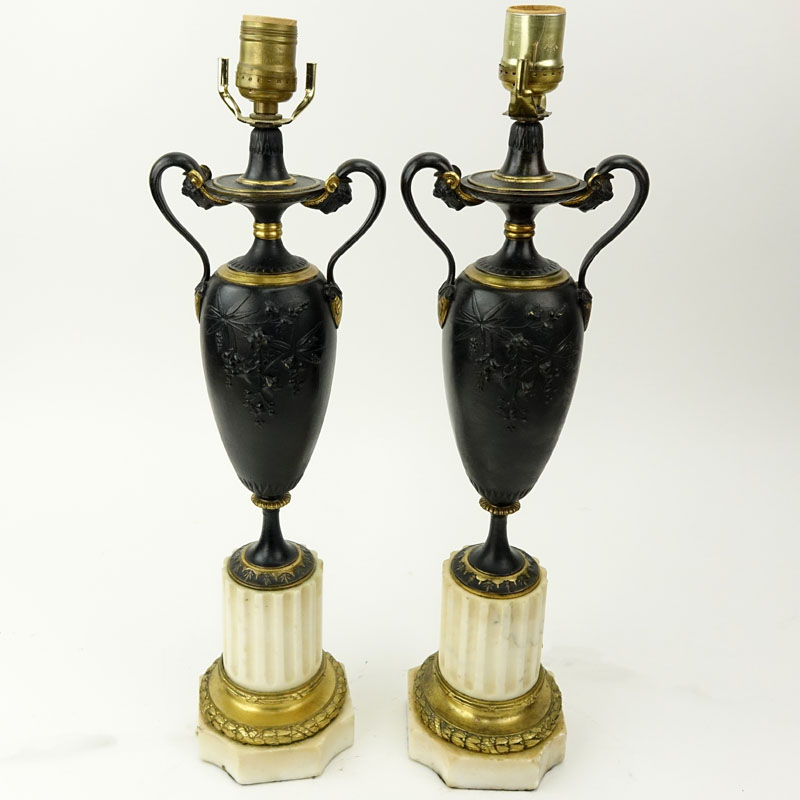 Pair Antique Louis XVI Style Bronze Urn Lamps. Patinated and gilt bronze on marble bases. Unsigned.