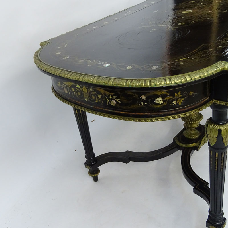 American Renaissance Gilt Bronze Mounted Mother of Pearl and Ebonized Library Table. Circa 1860.