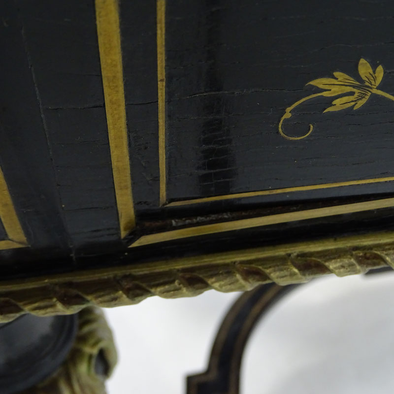 American Renaissance Gilt Bronze Mounted Mother of Pearl and Ebonized Library Table. Circa 1860.