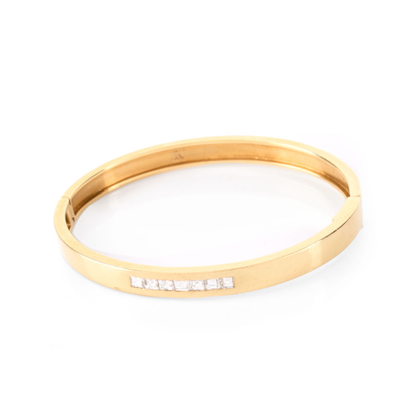 Vintage Cartier 18 Karat Yellow Gold and Square Cut Diamond Hinged Bangle Bracelet. Signed, stamped 18K. 