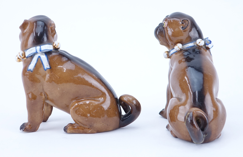 Pair Of Antique German Painted Porcelain Pug Figurines. No markings. Wear, one with repaired tail.
