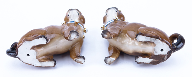 Pair Of Antique German Painted Porcelain Pug Figurines. No markings. Wear, one with repaired tail.