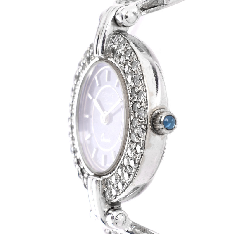 Lady's Vintage Geneve Supreme Diamond and 14 Karat White Gold Bracelet Watch with Quartz Movement.