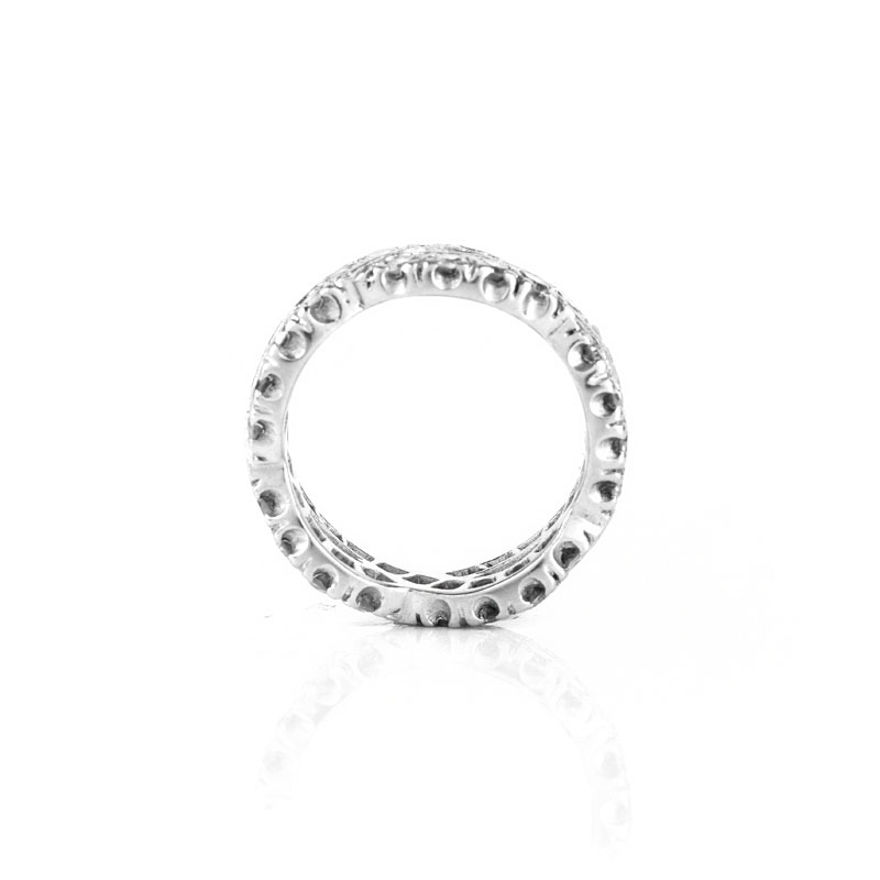 Vintage Approx.. 1.50 Carat Round Brilliant Cut Diamond and Platinum Eternity Band, Diamonds F-G color, VS1 clarity.