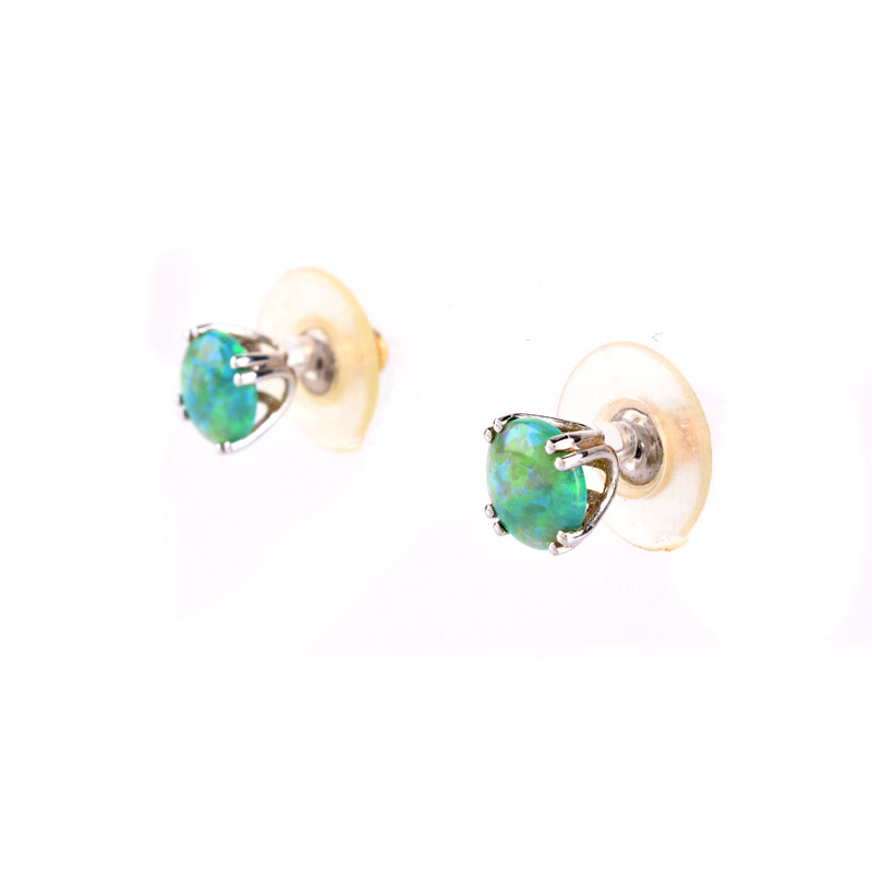 Vintage Black Opal and 14 Karat White Gold Stud Earrings. Opals measure 8mm diam. Stamped 14K.