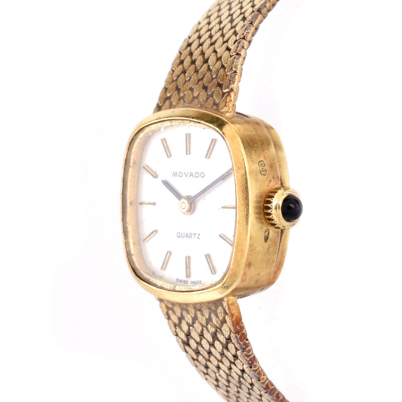 Lady's Vintage Movado 14 Karat Yellow Gold Bracelet Watch with Quartz Movement. Signed, stamped 585.