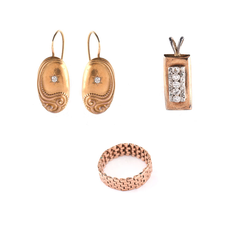 Antique 14 Karat Gold Lot Including a Yellow Gold Pendant with Diamonds, a Flexible Link Rose Gold Ring and Rose Gold Pendant Earrings with Diamonds.