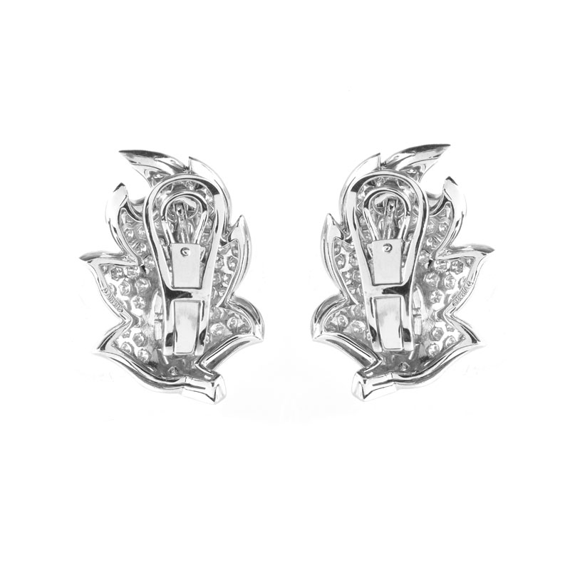 Approx. 4.25 Carat Pave Set Round Brilliant Cut Diamond. Baguette Cut Diamond and Platinum Leaf Earrings.