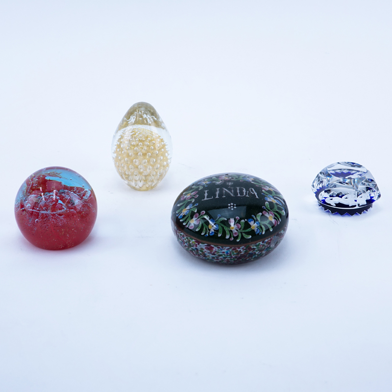 Lot of Four (4) Art Glass Paperweights. Includes Cartier, Baccarat, Caithness. Signed.