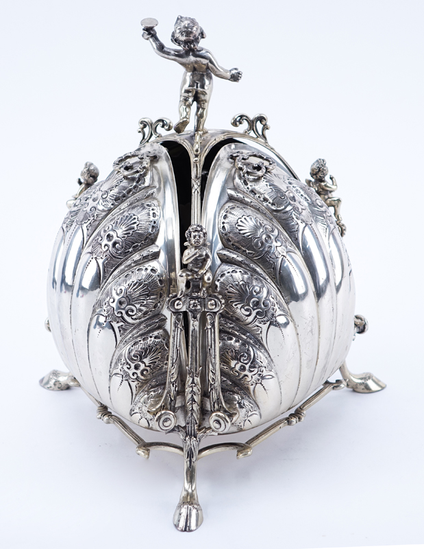 Victorian Silver Plate Tri-Fold Bun Warmer. Decorated with chased Rococo design and figural putti finials. Signed. Good condition.