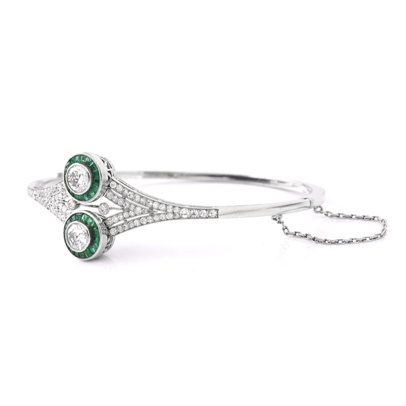 Art Deco style Approx. 2.50 Carat TW Diamond, Emerald and 18 Karat White Gold Hinged Bangle Bracelet. 