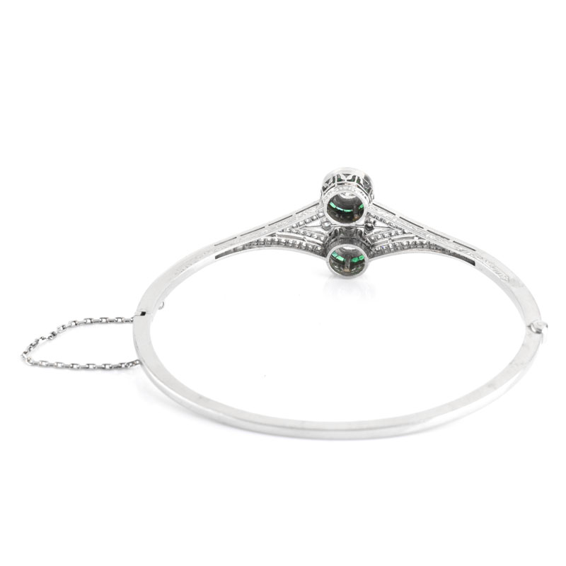 Art Deco style Approx. 2.50 Carat TW Diamond, Emerald and 18 Karat White Gold Hinged Bangle Bracelet. 