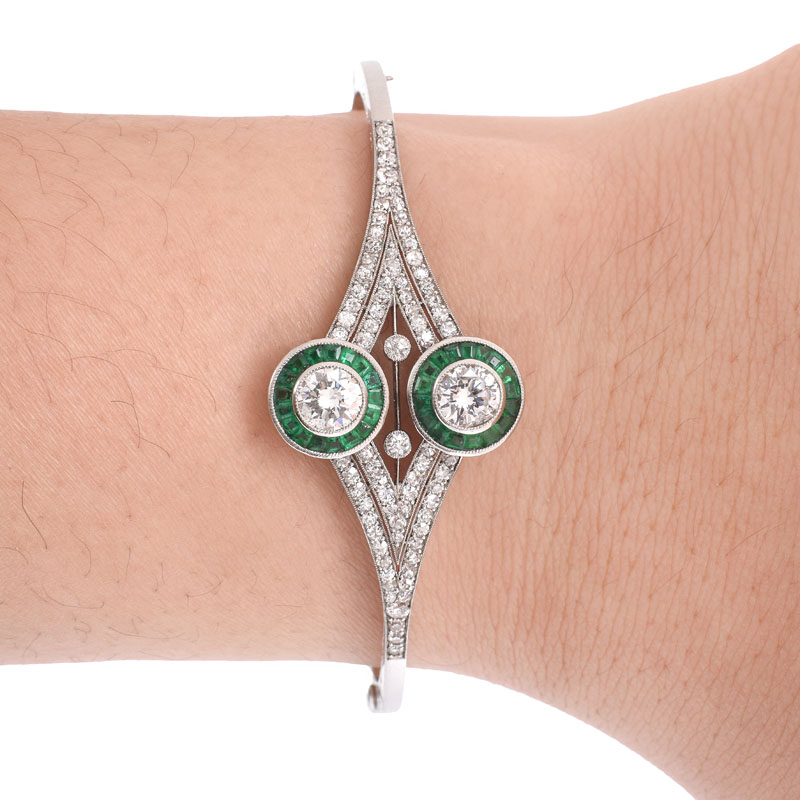 Art Deco style Approx. 2.50 Carat TW Diamond, Emerald and 18 Karat White Gold Hinged Bangle Bracelet. 