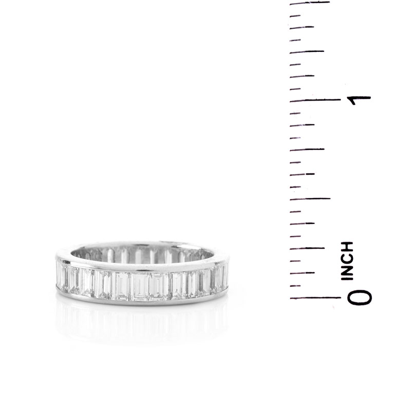 Approx. 4.25 Carat Baguette Cut Diamond and Platinum Eternity Band. Diamonds F-G color, VS clarity.