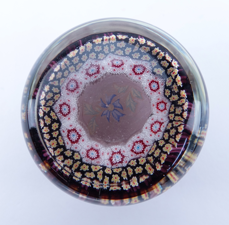 Vintage Millefiori Baccarat Style Glass paperweight. Unsigned. Good condition. Measures 2" H.