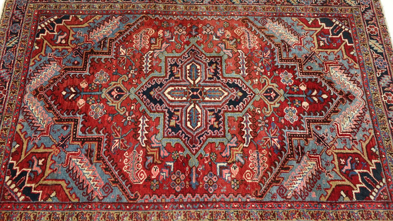 Semi Antique Persian Wool Oriental Rug. Label on underside. Loss to fringes, some typical discoloration, wear to fringes, dirty.