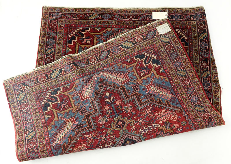 Semi Antique Persian Wool Oriental Rug. Label on underside. Loss to fringes, some typical discoloration, wear to fringes, dirty.