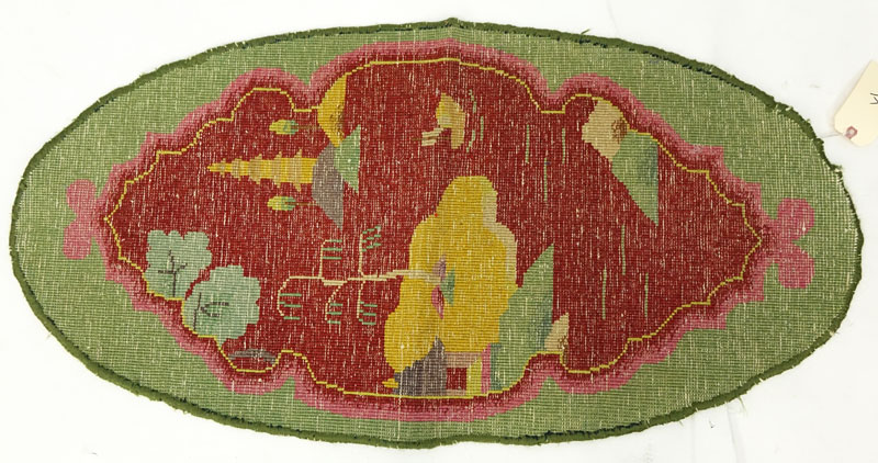 Chinese Nichols Rug: Oval shape with green and red colors. Fading, fraying to edges, dirty, needs cleaning.