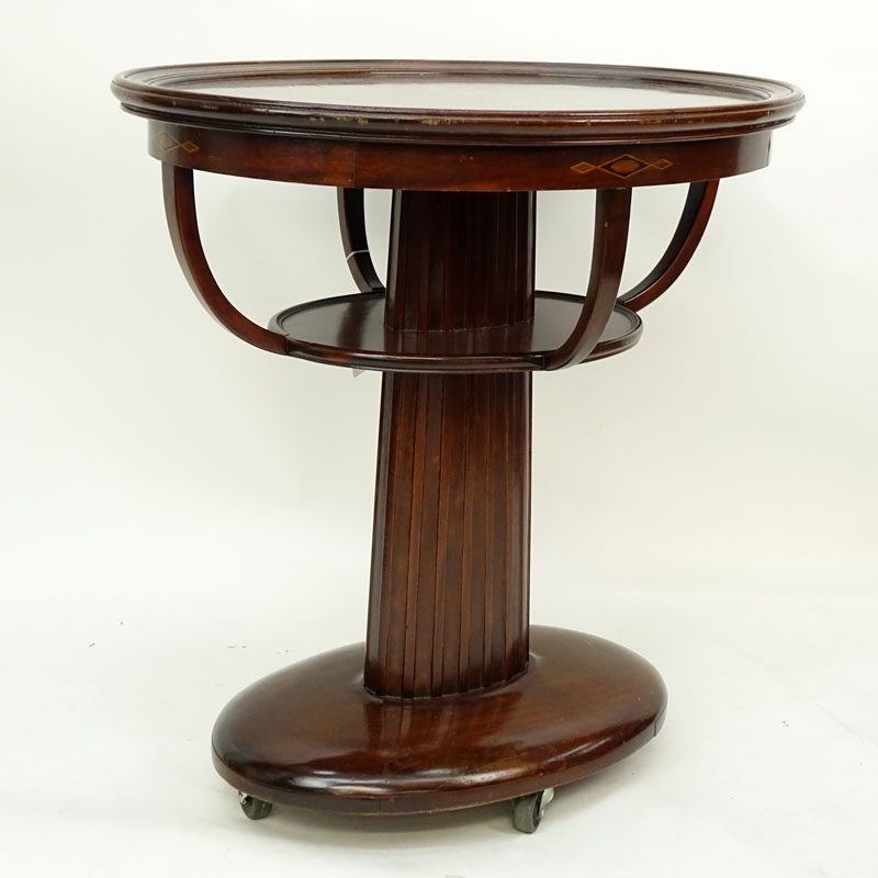 Antique Miller Cabinet Co. Mahogany Inlaid Oval Table on Wheels. Miller Cabinet Co., Rochester, N.Y. No. 