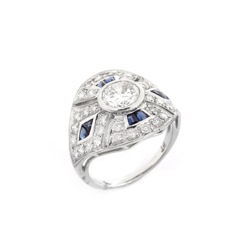 Art Deco style Diamond, Sapphire and Platinum Ring set in the Center with Round Brilliant Cut Diamond.