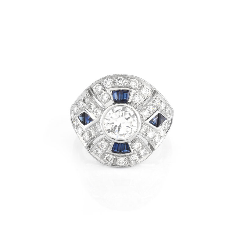 Art Deco style Diamond, Sapphire and Platinum Ring set in the Center with Round Brilliant Cut Diamond.