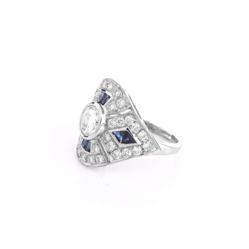 Art Deco style Diamond, Sapphire and Platinum Ring set in the Center with Round Brilliant Cut Diamond.