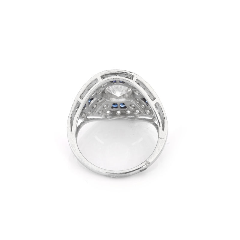 Art Deco style Diamond, Sapphire and Platinum Ring set in the Center with Round Brilliant Cut Diamond.