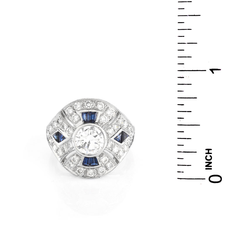 Art Deco style Diamond, Sapphire and Platinum Ring set in the Center with Round Brilliant Cut Diamond.