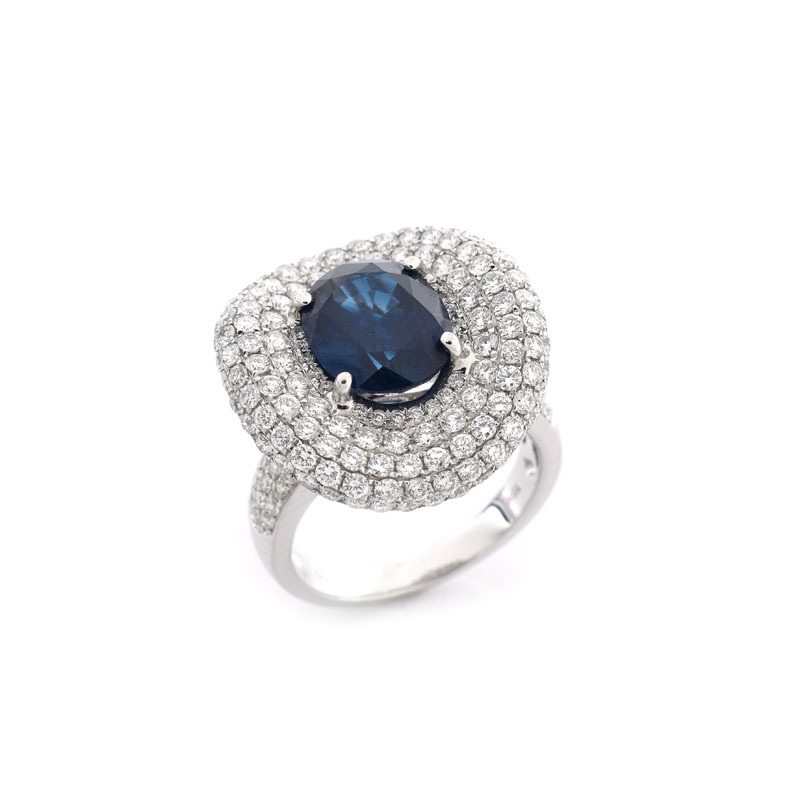 Approx. 4.0 Carat Oval Cut Sapphire, 3.25 Carat Pave Set Round Brilliant Cut Diamond and 18 karat White Gold Ring.