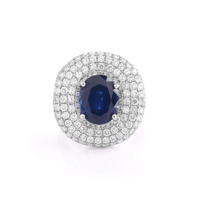 Approx. 4.0 Carat Oval Cut Sapphire, 3.25 Carat Pave Set Round Brilliant Cut Diamond and 18 karat White Gold Ring.