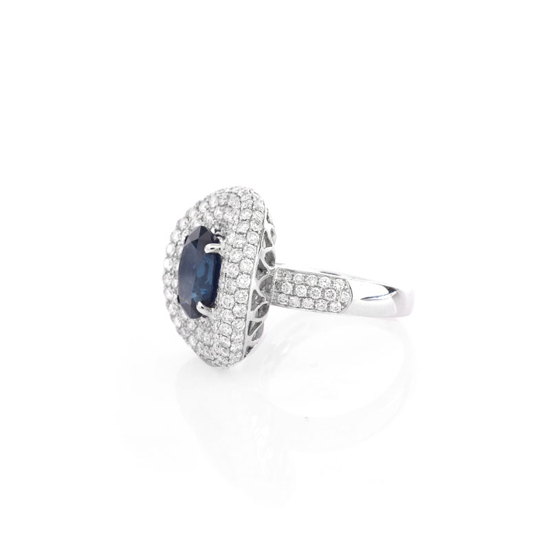 Approx. 4.0 Carat Oval Cut Sapphire, 3.25 Carat Pave Set Round Brilliant Cut Diamond and 18 karat White Gold Ring.