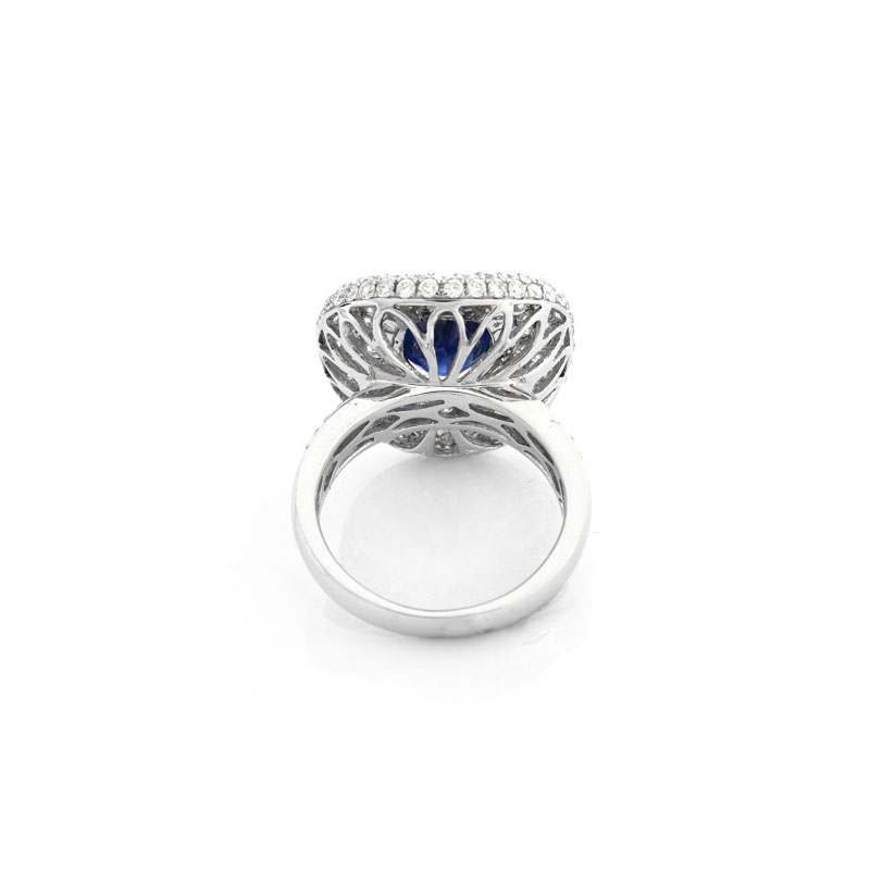 Approx. 4.0 Carat Oval Cut Sapphire, 3.25 Carat Pave Set Round Brilliant Cut Diamond and 18 karat White Gold Ring.