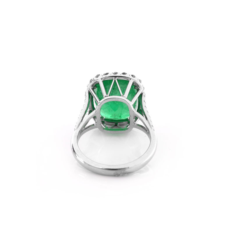 Approx. 9.0 Carat Cushion Cut Colombian Emerald, .95 Carat Round Brilliant Cut Diamond and 18 Karat White Gold Ring.