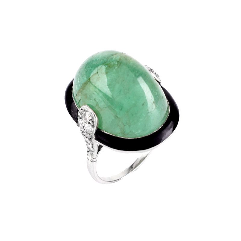 Estate Large Cabochon Emerald, Diamond, Black Onyx and 18 Karat White Gold Ring. Emerald measures 21mm x 14mm. 